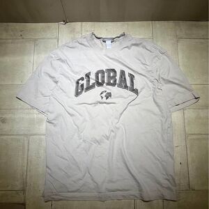 cream-colored "Global Our Neighborhood" t-shirt from H&M size medium